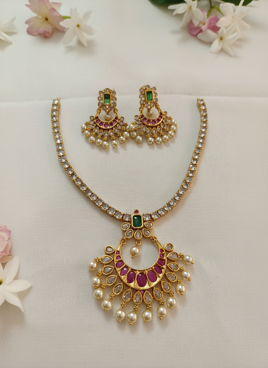 Necklace on cream satin cloth with flowers