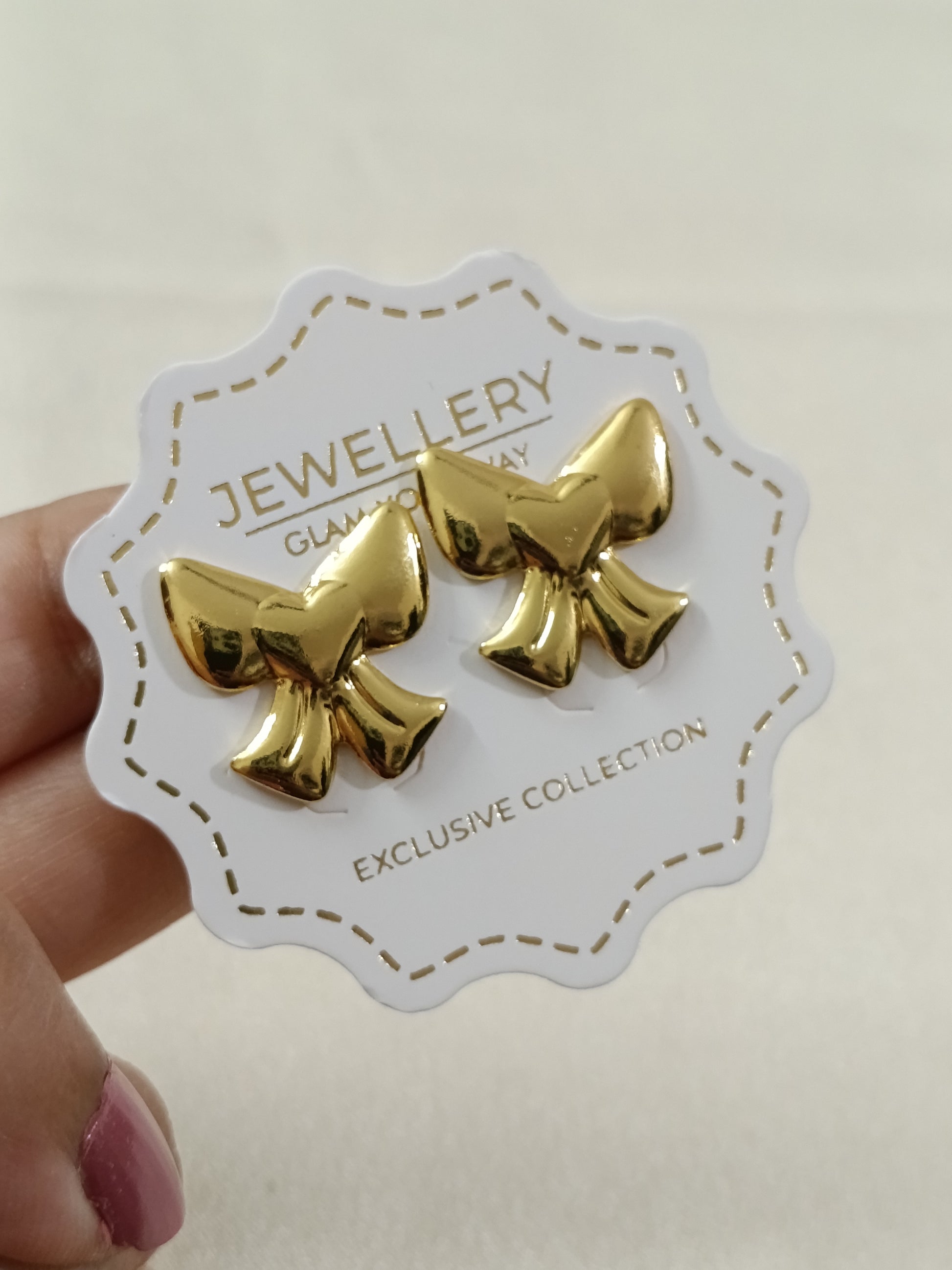 Gold Tone Ribbon Earring