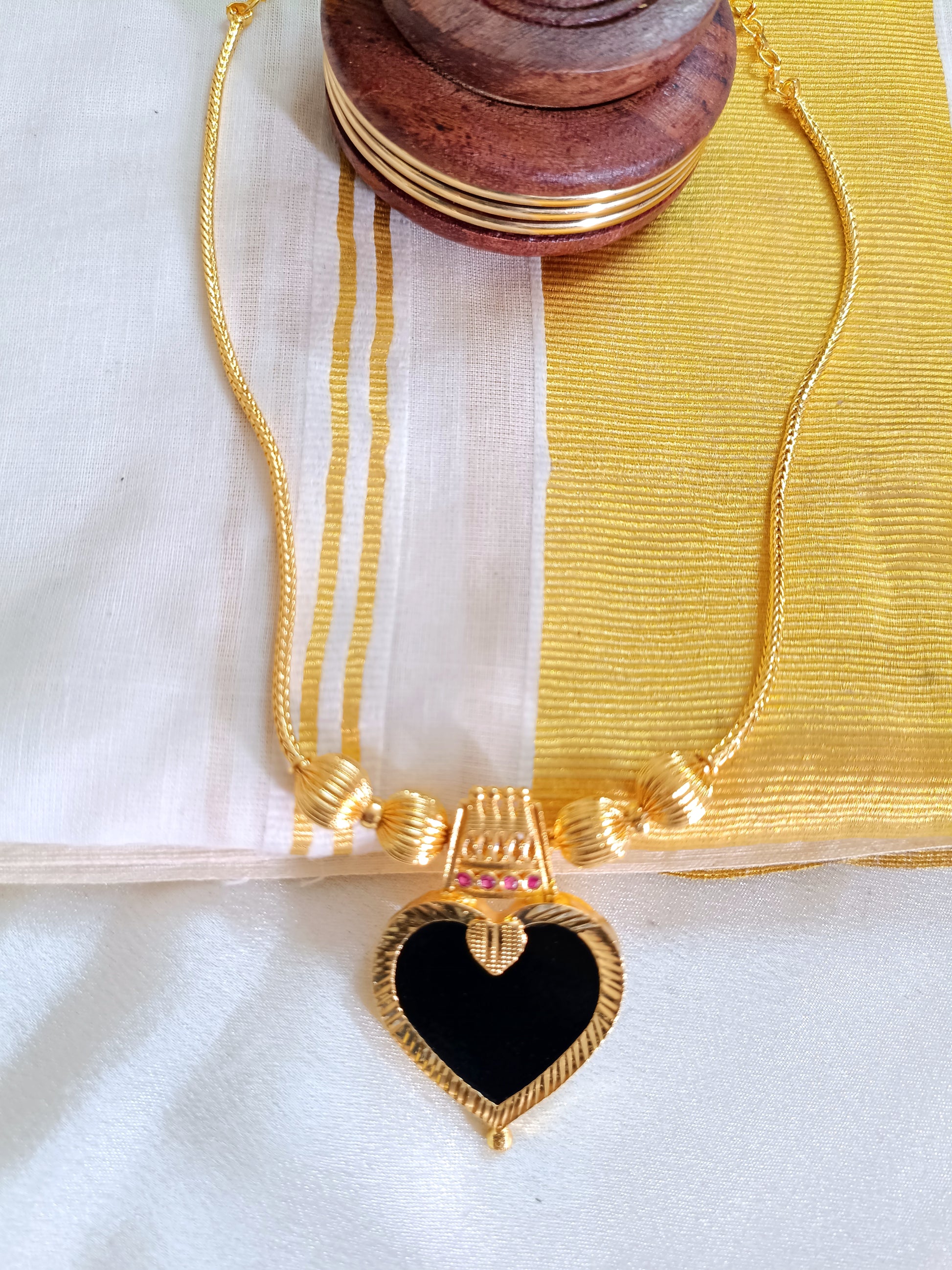 Micro Polish Heart Palakka Pendant Mid Long Necklace