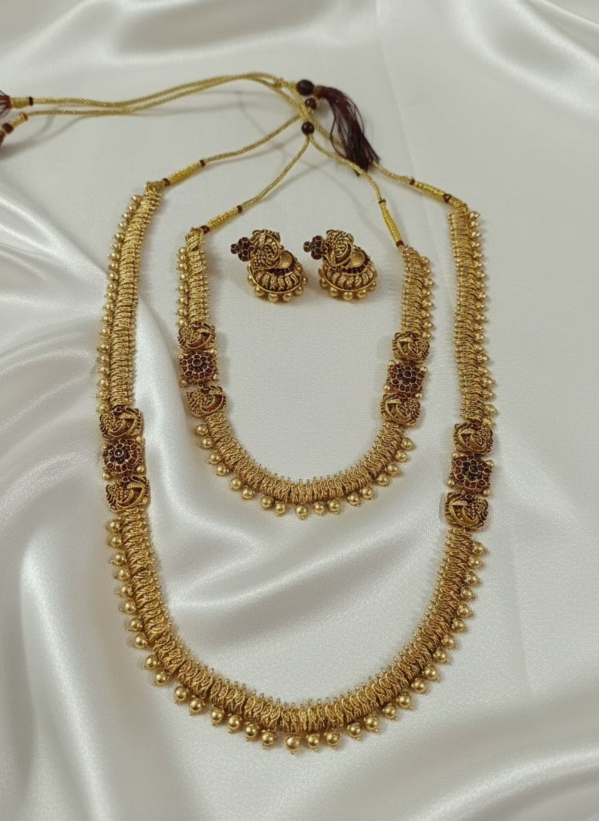 Temple Jewelry Necklace Set on White Satin