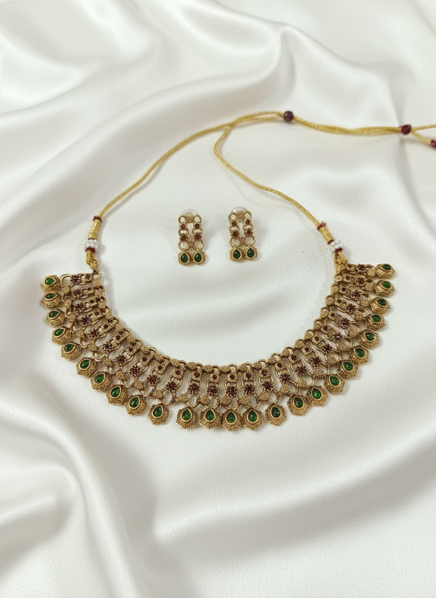 Temple jewelry set on white satin cloth